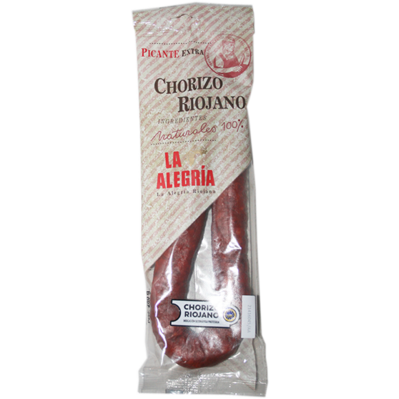 chorizo Riojano IGP picante endossé dans du boyau naturel. Viande de porc, paprika, ail et sel. Parfum profond et épicé. Coupe nette, grain régulier.