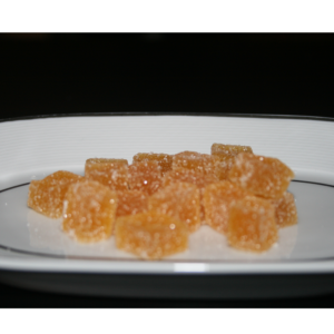 Clementine de Calabre IGP sous forme de Pâte de fruit. Minimum 40% de fruit. Riche en goût, pratique à emporter partout et en toute saison.